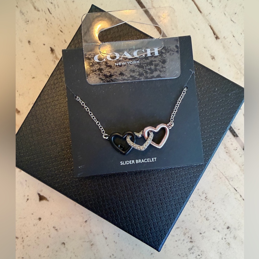 New Coach Black and Silver Interlocking Heart Slider Bracelet